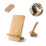 97132 LANGE. Carregador portátil em bambu Carregador wireless e suporte em bambu para smartphone. Possui uma potência de carregamento sem fios de 10W. Compatível com smartphones com tecnologia de carregamento sem fios. O suporte em bambu consiste em 2 partes desmontadas. Incluso cabo de 1 metro. Fornecido em caixa presente de papel kraft. 140 x 80 x 8 mm